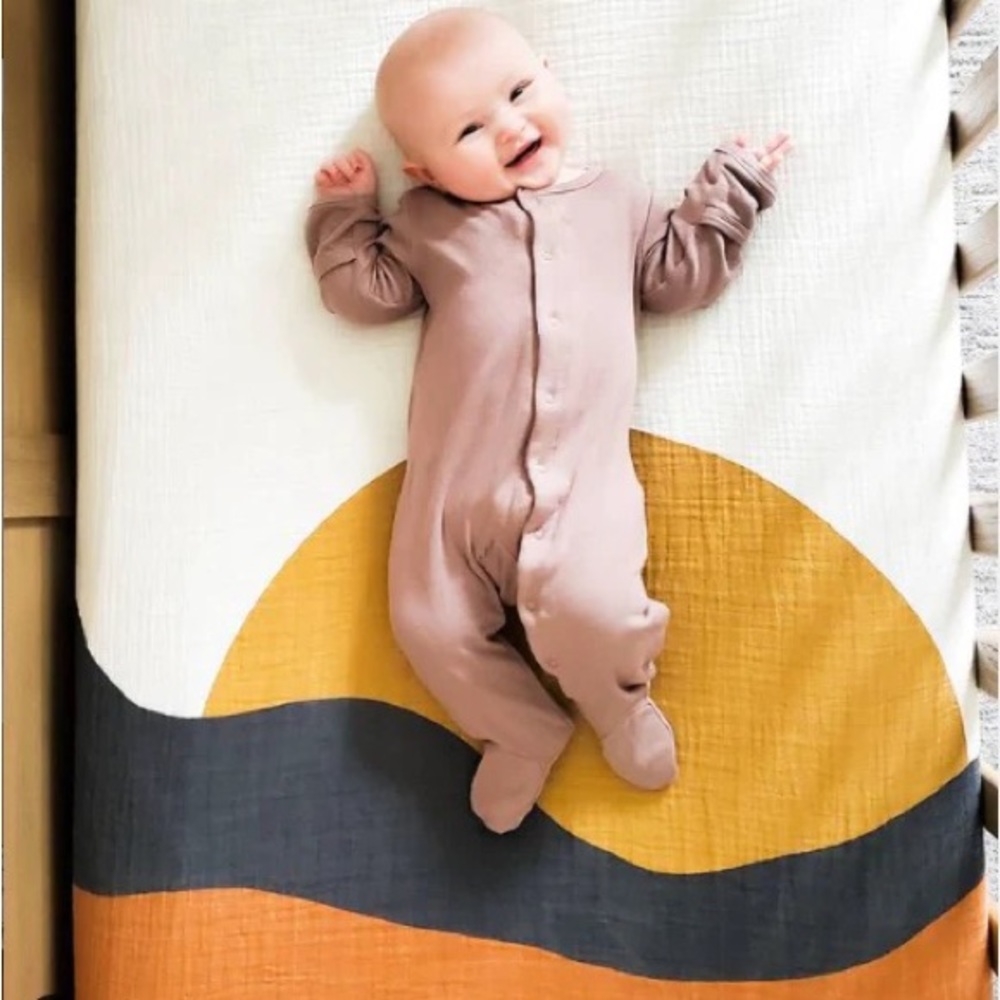 Clementine kids sunset crib sheet. Also fits a school cot